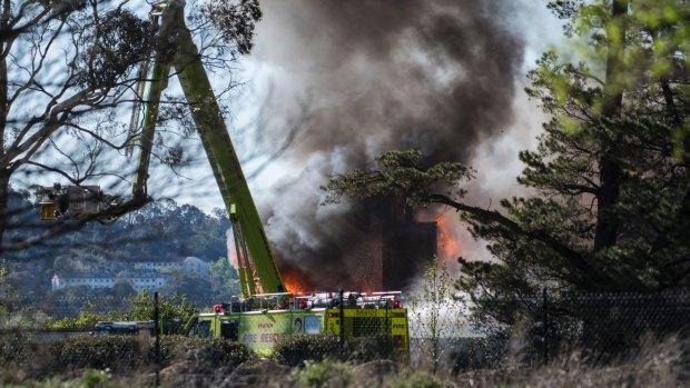 Emergency services battle a fire at Pialligo Estate.