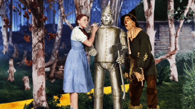 Judy Garland with Jack Haley and Ray Bolger in the 1939 film <i>The Wizard of Oz</i>.