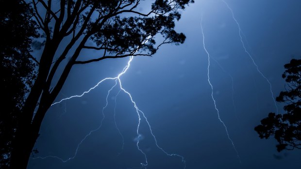 A line of severe thunderstorms track east over the Blue Mountains late on Thursday night. 