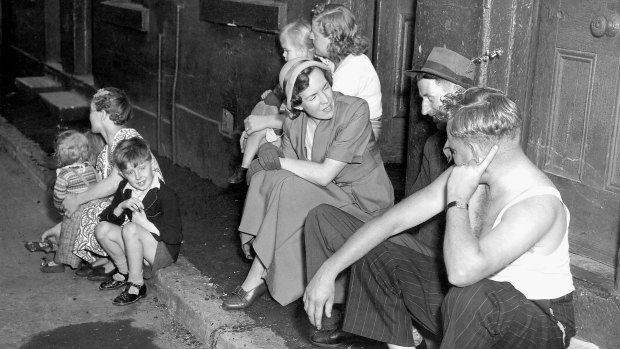 THE BIG PICTURE Ruth Park talks to Surry Hills locals about the new housing commission scheme for the suburb, in December 1951. Rich and Rare. Woman. Picture by staff. Ruth Park visits people in Surry Hills on 1 December 1951. slums**PLEASE NOTE, NOT TO BE USED BEFORE PUBLICATION OF THE RICH AND RARE BOOK - 2006**