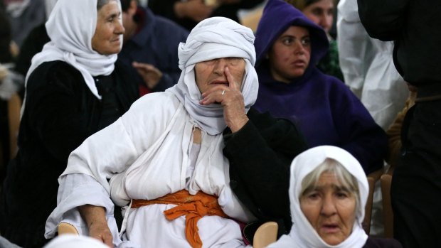 Yazidi women rest at the al-Tun Kopri health centre after their release from IS captivity.