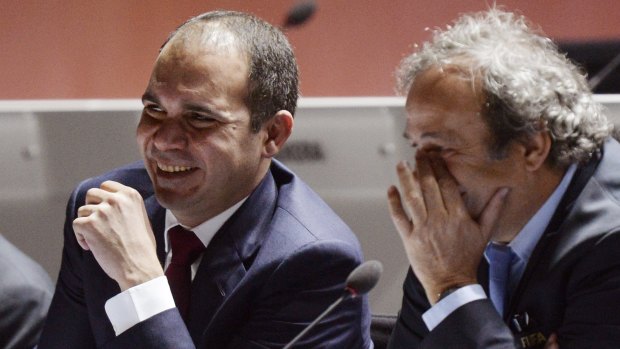 Prince Ali bin al-Hussein and UEFA president Michel Platini attend the 65th FIFA Congress in Zurich on Friday.