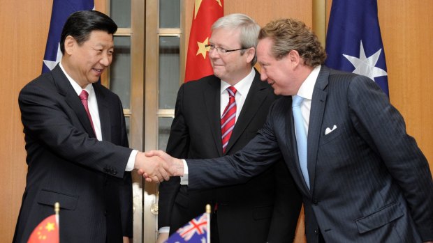 June 2010: Then vice-president and now President Xi Jinping, left, shakes hands with Fortescue Metals Group CEO Andrew Forrest as prime minister Kevin Rudd looks on in Canberra. 