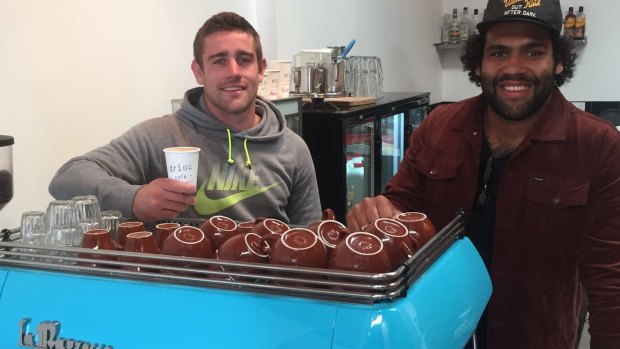 Broncos players Sam Thaiday and Andrew McCullough at their new Drinc cafe.