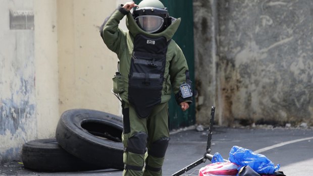 A Philippine bomb squad member during an anti-terror exercise in Quezon city, north of Manila, on Tuesday.