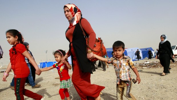 Refugees fleeing from Mosul after IS took over the northern Iraq city in June last year.