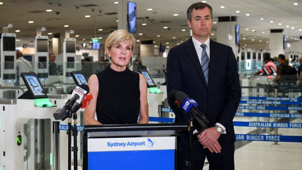 Foreign Affairs Minister Julie Bishop and Justice Minister Michael Keenan tell reporters at Sydney Airport's international terminal that a paedophile was stopped at the SmartGates and prevented from travelling overseas under new laws.