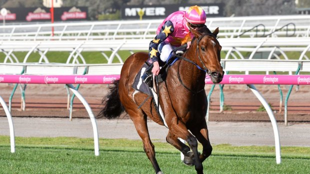 Running away from his rivals: Daniel Moor rides De Little at the Andrew Ramsden Stakes.