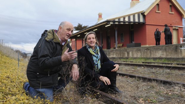 Rail Trails for NSW Inc chairman John Moore and Michelago Region Community Association president Cate Spencer at the Michelago railway station.