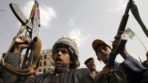Tensions rising: Boys loyal to the Houthi movement at an anti-Saudi demonstration in Sanaa on Friday.