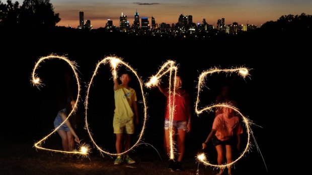 A group of teenagers gathers at a park in Kew to celebrate New Year's Eve. 