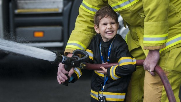 Cerebral palsy sufferer, four year old Blake Tummer gets his wish to be a fireman for a day.
