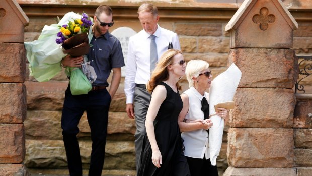 Brother Dallas, father Dudley, sister Cydane and mother Orlis Morgan leave the funeral of their son and pilot Gareth Morgan.