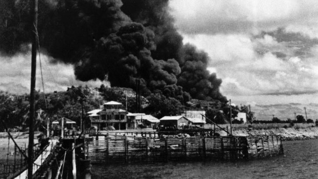 Oil tanks on fire in Darwin after the 1942 bombings.