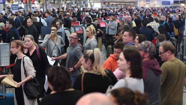 Huge queues are seen at Sydney Airport this week as passengers were subjected to increased security measures.