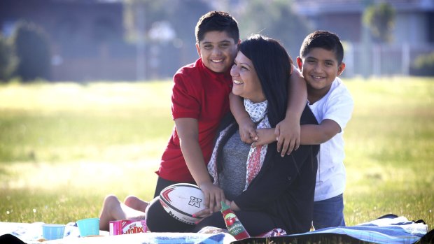 Rebecca Mackey with her two sons, Malachi, aged 13, and Zak, 8.