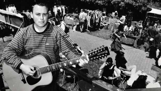 Carl Fidler busking on a Saturday morning at Gorman House Markets in 1993.