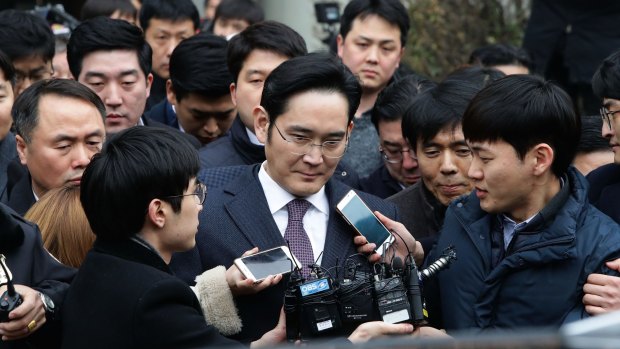 Lee Jae-yong, vice chairman of Samsung, leaves after attending a court hearing at the Seoul Central District Court.