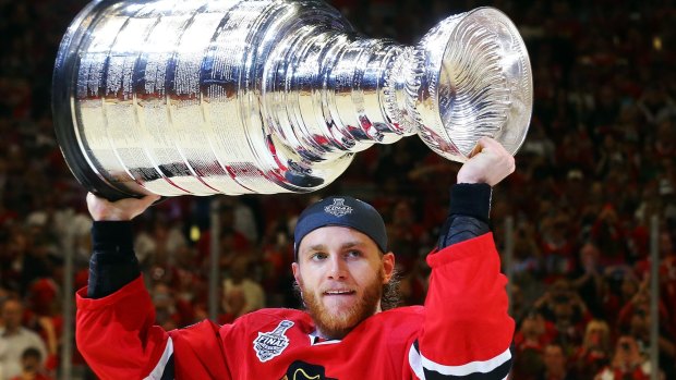Patrick Kane hoists the Stanley Cup for the third time after the Chicago Blackhawks defeated the Tampa Bay Lightning in 2015.
