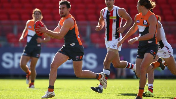 Tough ask: Stephen Coniglio will have the unenviable task of containing Gary Ablett. 