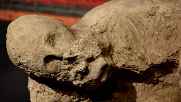 A plaster cast of a body discovered buried in volcanic ash in the ancient Roman city of Pompeii. 