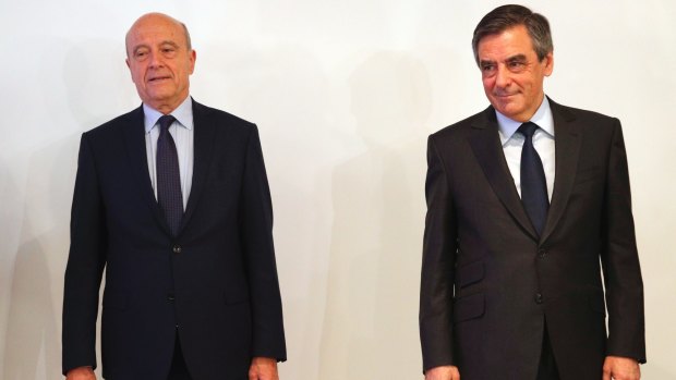 Conservative's party presidential nominee, Francois Fillon, right, and runner-up, Alain Juppe, last month.