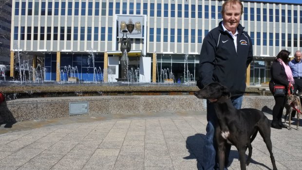 Breeder Alan Tutt with his greyhound Liz outside of the ACT Legislative Assembly on Friday