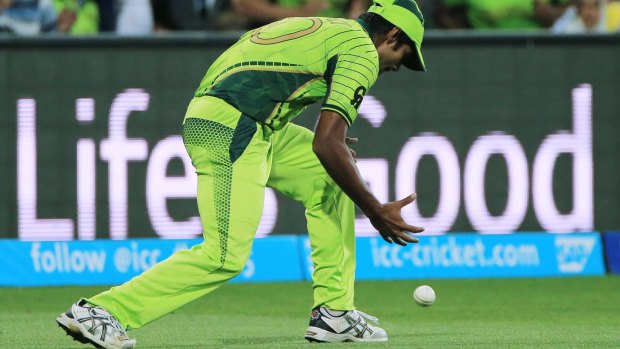 Costly spill: Pakistan's Rahat Ali drops a catch off Shane Watson in Adelaide on Friday night.