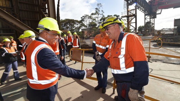 GFG Alliance executive chairman Sanjeev Gupta chats with workers during his visit to the Arrium steelworks in Whyalla, South Australia.