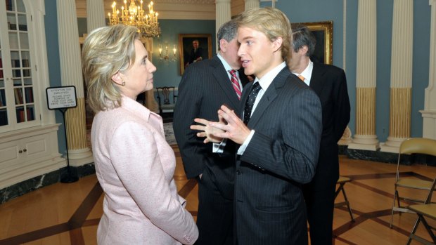 Ronan Farrow with Hillary Clinton during his time as a foreign services officer.