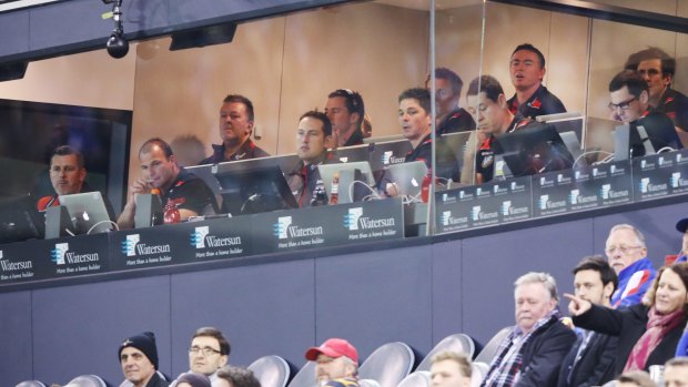 The AFL coaches' box: A microcosm of sport, theatre, energy and angst.