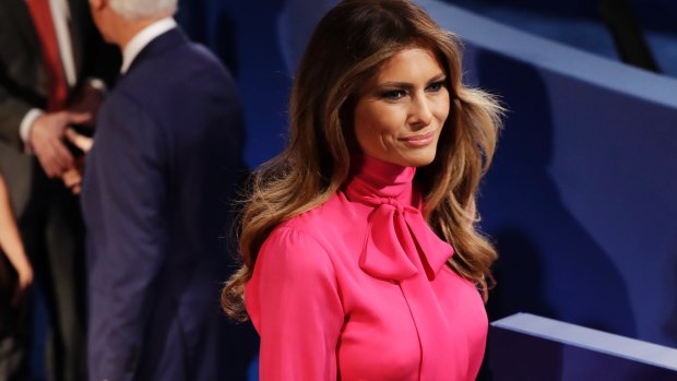 Prior to donning this "pussy bow" outfit, Melania Trump said her husband's lewd comments about women were "unacceptable and offensive". 