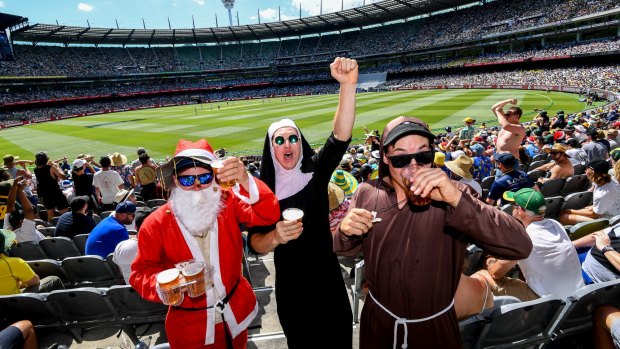 Father Christmas, Sister Cricket and Father Cannon get into the spirit of the Test.