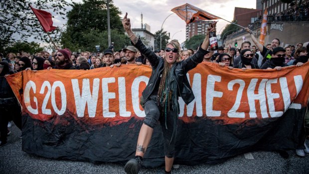 Demonstrators attend the "Welcome to Hell" anti-G20 protest march near Hamburg harbour on July 6.