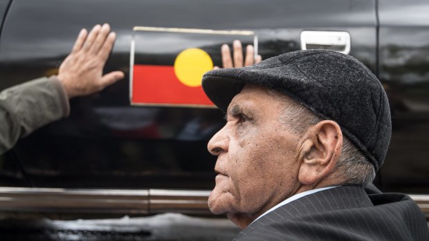 Uncle Herb Patten welcomes the car, with the Aboriginal flag on the door, back into commission.