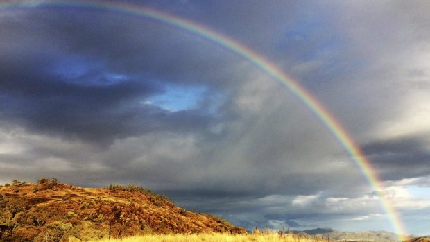 After the rain: This rainbow was captured over Tuggeranong from Coolamon Ridge.