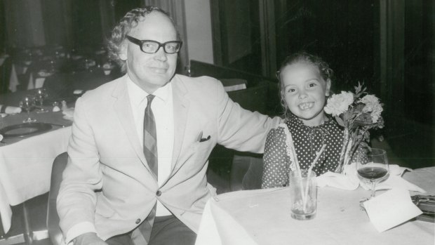Emma Harcourt with her father Bill on her sixth birthday outing to a revolving restaurant.