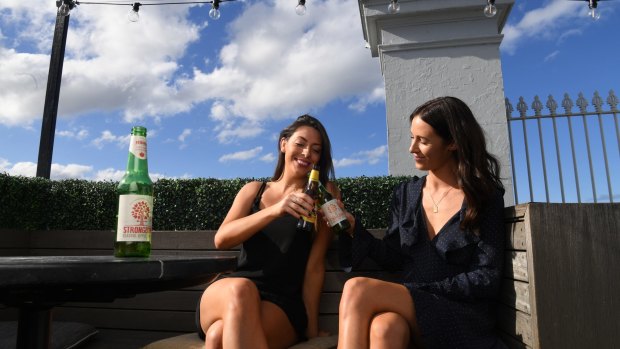 Lauren Ostler, 26, and Allie Frame, 30, enjoying their ciders on the rooftop at the Royal Hotel Paddington. 