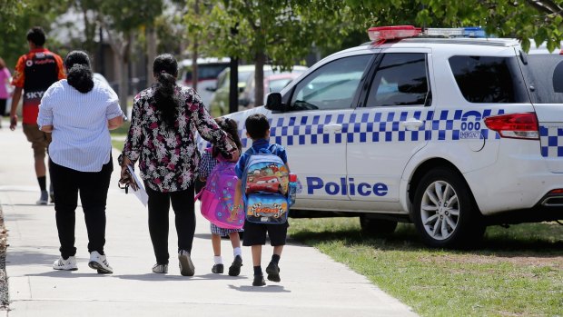Police are seen at Aitken Creek Primary School in Craigieburn after students were evacuated.