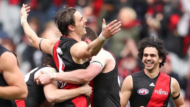 Joe Daniher celebrates after kicking one of his five goals against Carlton.
