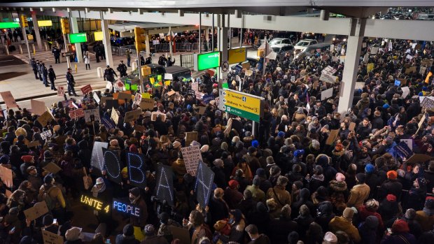 Protesters assemble at John F. Kennedy International Airport in New York. 