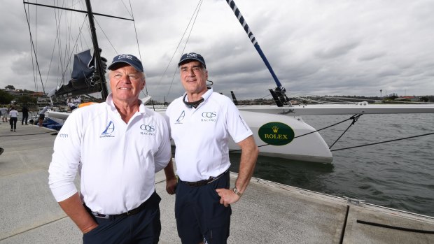 Confident: Ludde Ingvall and Sir Michael Hintze with their rebuilt yacht.