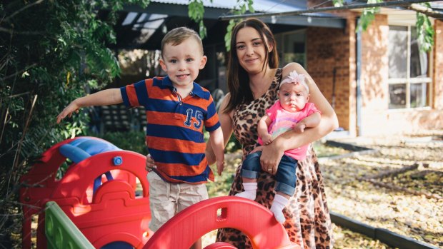 Nicole Tarling with her two children Colby, 3, and Olivia, 5 months, at home in Banks. 