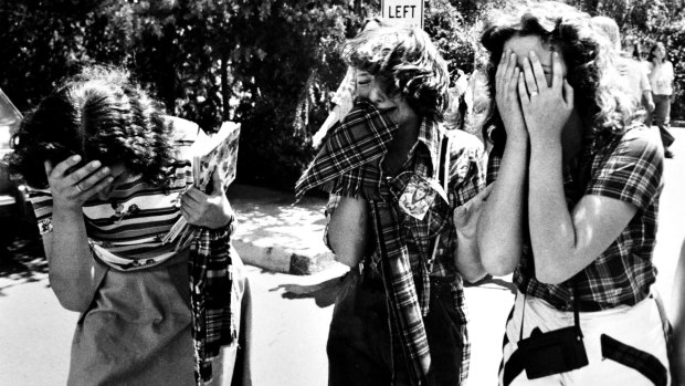 December 1975: Distraught Bay City Rollers fans at Canberra Airport, upset that band member Alan Longmuir was taken off the plane and put into a waiting ambulance suffering heat exhaustion.
