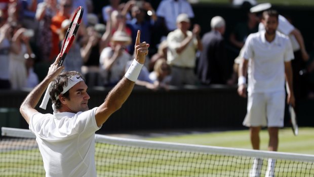 Number one: Federer celebrates.
