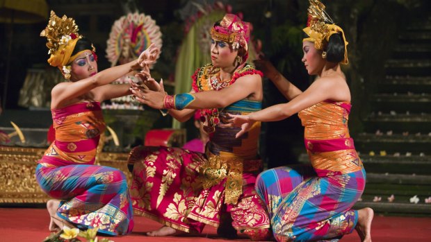 Dancers from the Cenik Wayah Gamelan Group perform at Pura Taman Saraswati, Ubud, Bali.