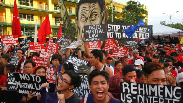 Protesters outside Duterte's second state of the nation address.