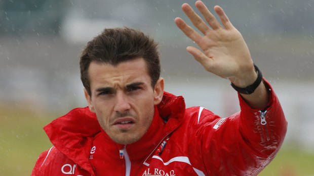 Gone too soon: Marussia driver Jules Bianchi of France waves during the drivers' parade before the 2014 Japanese Formula One Grand Prix at the Suzuka Circuit.