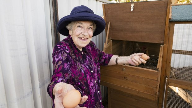 Residents help tend the chickens and collect the eggs.


