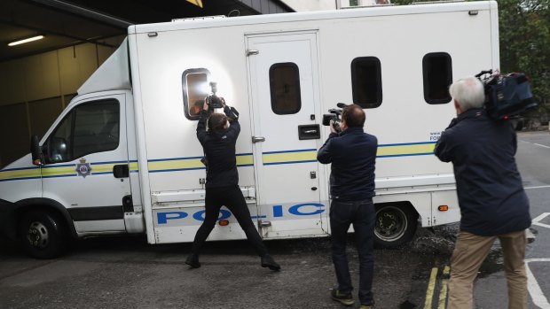 A police van believed to be carrying Thomas Mair arrives to Westminster Magistrates' Court on Saturday.